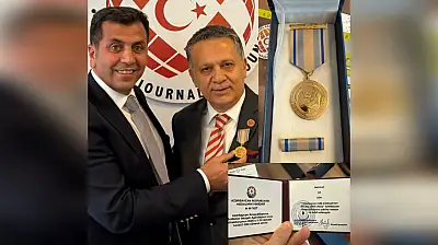 Başkan Dim'e Azerbaycan'dan büyük onur