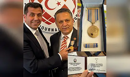 Başkan Dim'e Azerbaycan'dan büyük onur