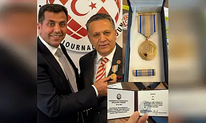Başkan Dim'e Azerbaycan'dan büyük onur
