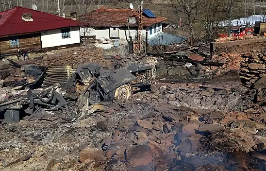 Yangında zarar gören ailelerin yaraları sarılıyor