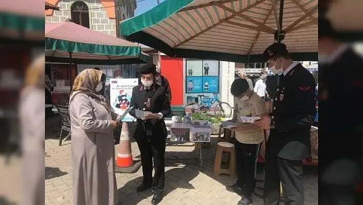 Jandarma kadın ve çocuğa şiddete karşı broşür dağıttı