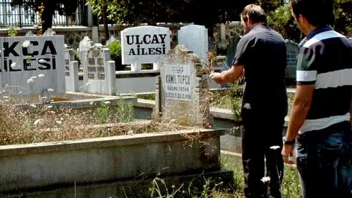 950 bin TL'lik yolsuzluk davasının belgesini dedesinin mezarından çıkardı